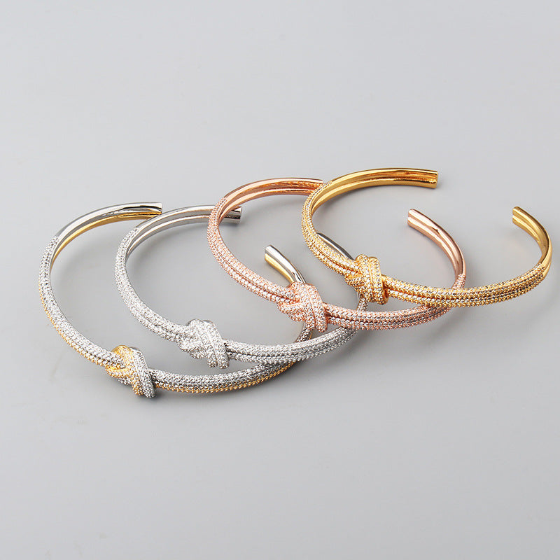 Pulsera de nudo de circón galvanizado de dos tonos
