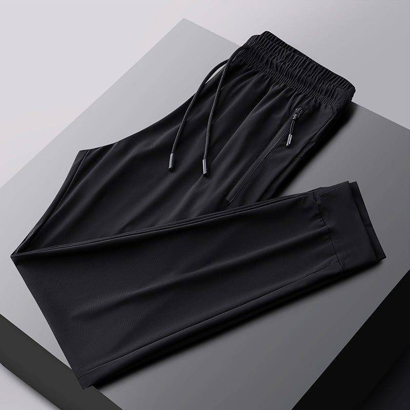 Pantalones deportivos transpirables elásticos de secado rápido