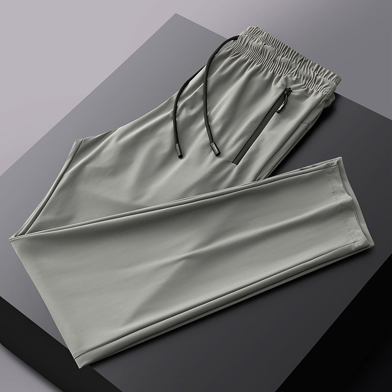 Pantalones deportivos transpirables elásticos de secado rápido