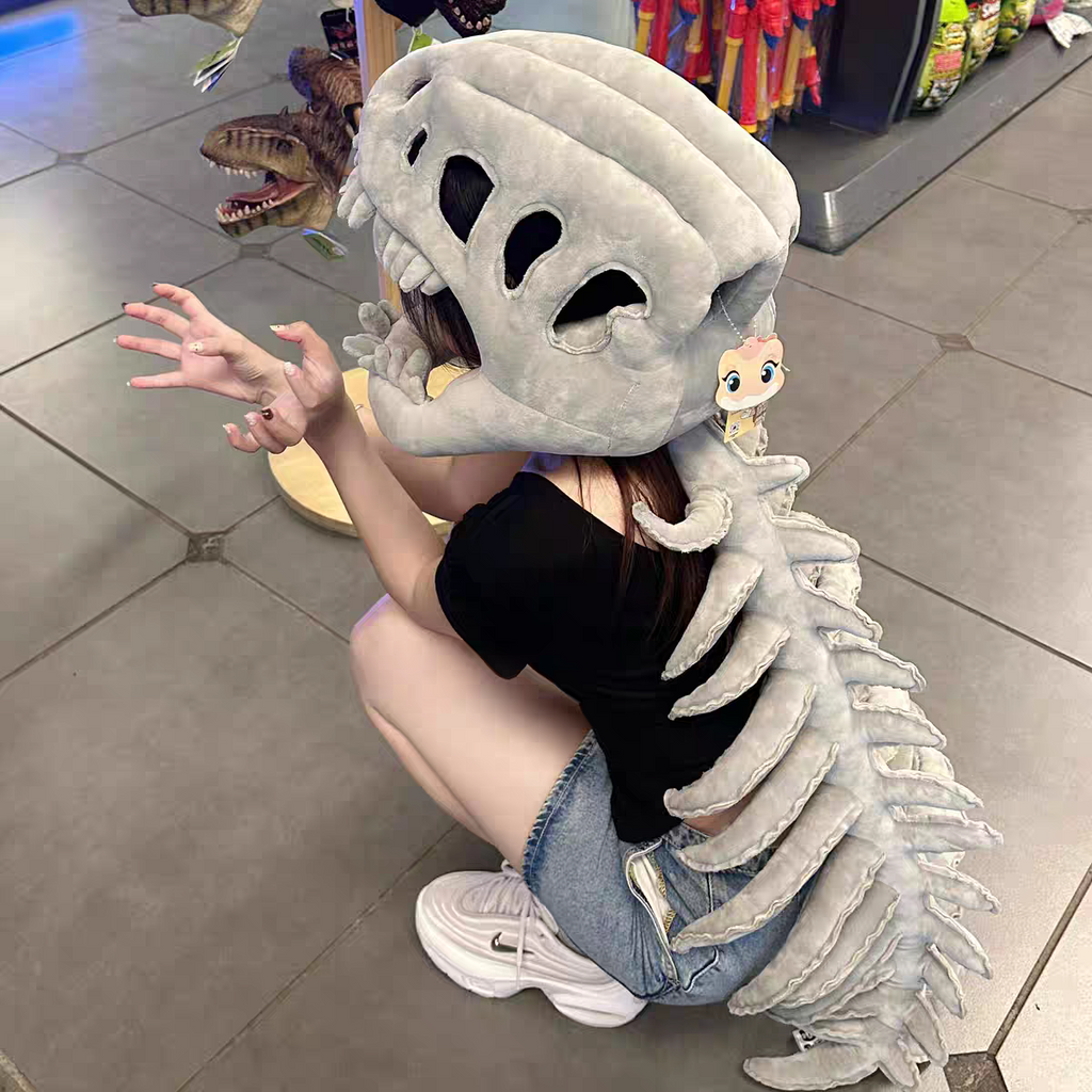 Peluche de esqueleto de dinosaurio