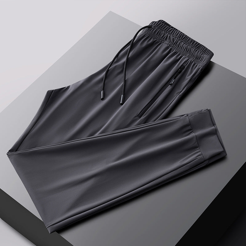 Pantalones deportivos transpirables elásticos de secado rápido
