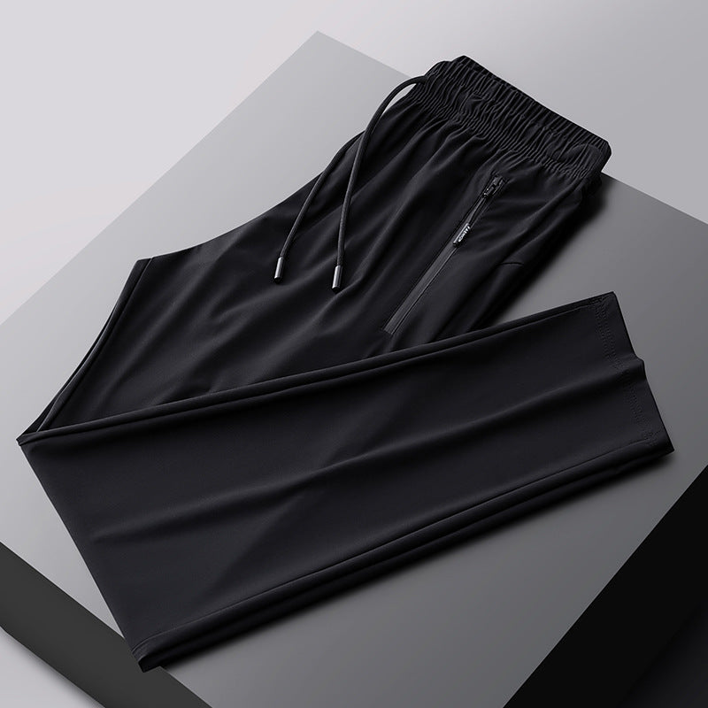 Pantalones deportivos transpirables elásticos de secado rápido