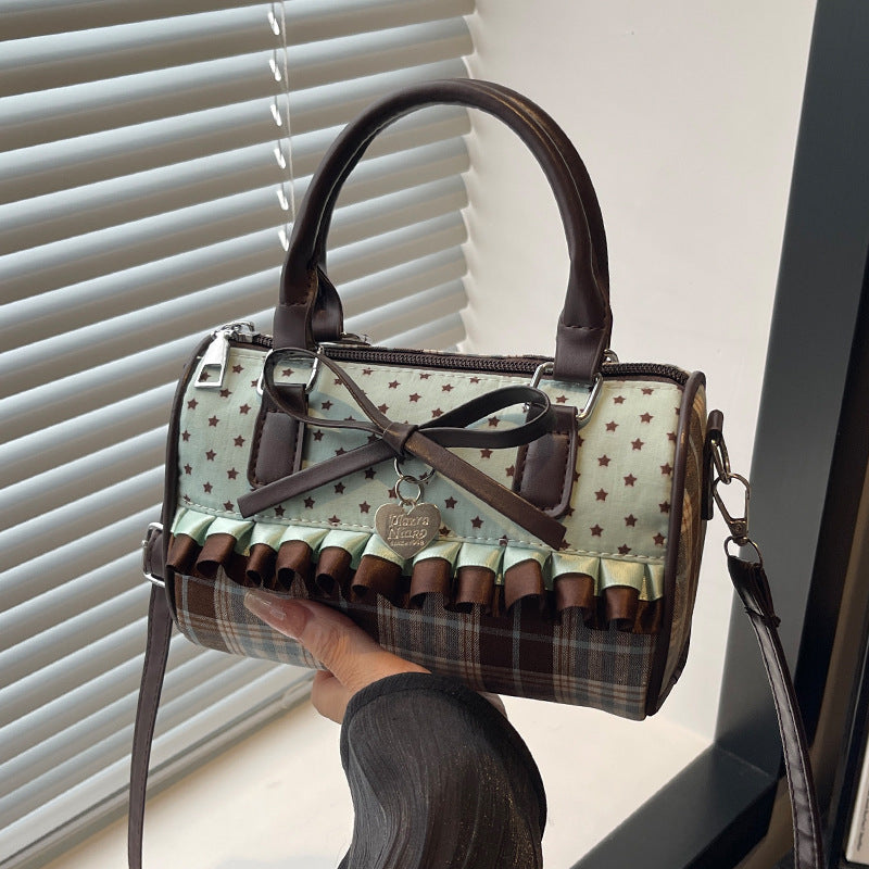 Bolso con detalle de lazo