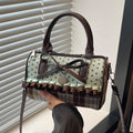 Bolso con detalle de lazo