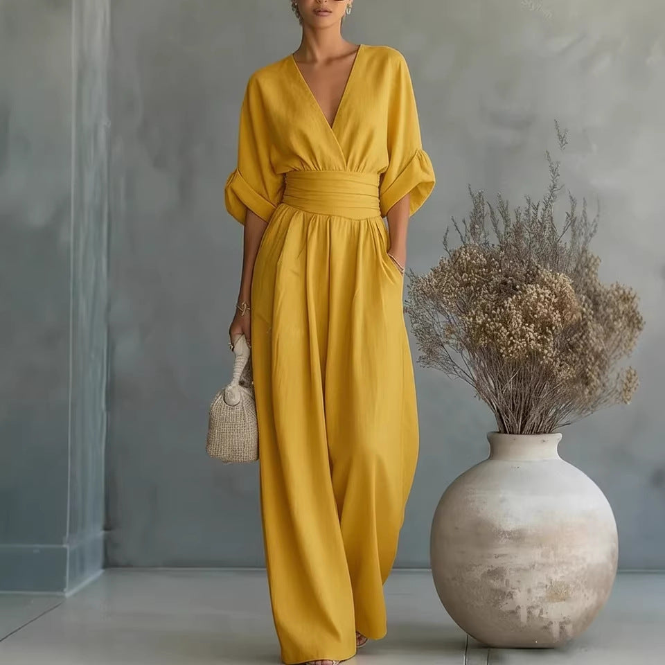 Elegante mono de mujer con cuello en V y cintura