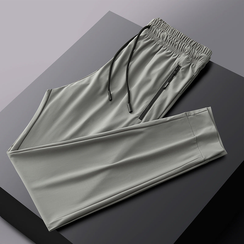 Pantalones deportivos transpirables elásticos de secado rápido