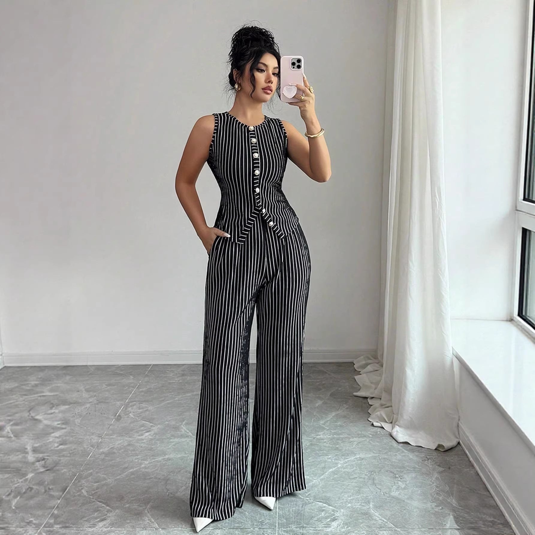 Conjunto de chaleco retro a rayas y pantalones de perna ancha para mujer