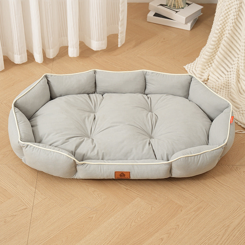 Cama ovalada de gamuza para perros