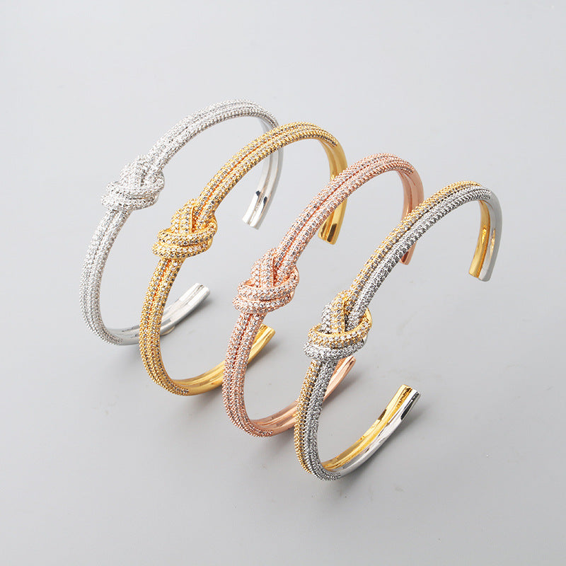 Pulsera de nudo de circón galvanizado de dos tonos