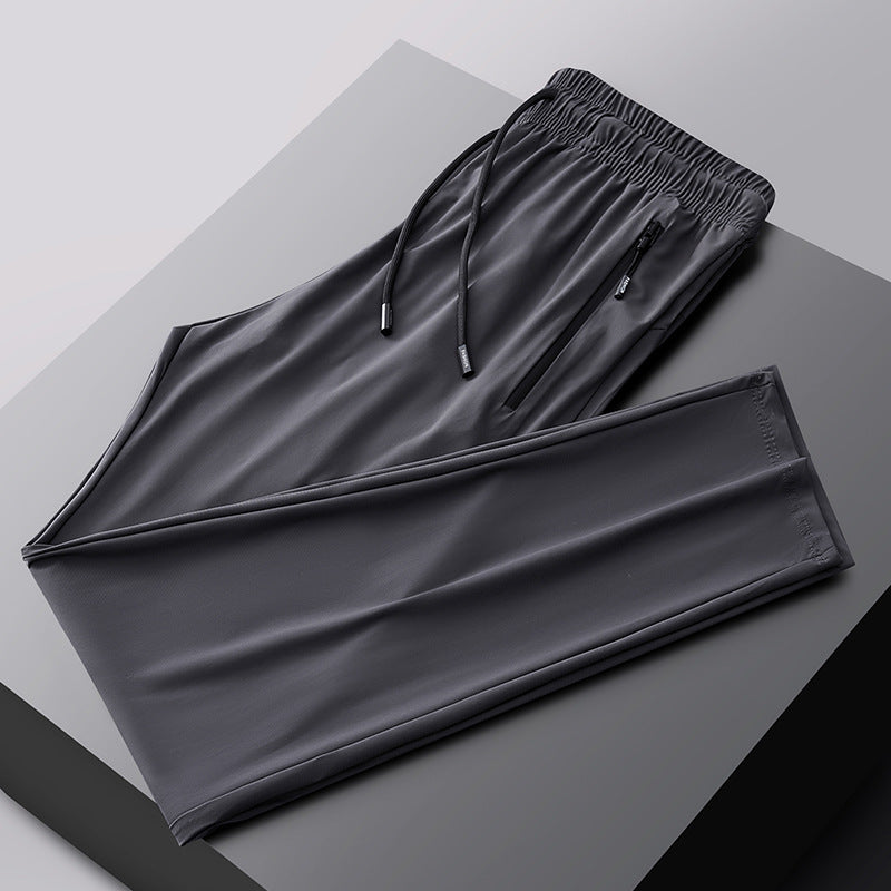 Pantalones deportivos transpirables elásticos de secado rápido
