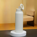 Botella de agua con aislamiento magnético con soporte para teléfono