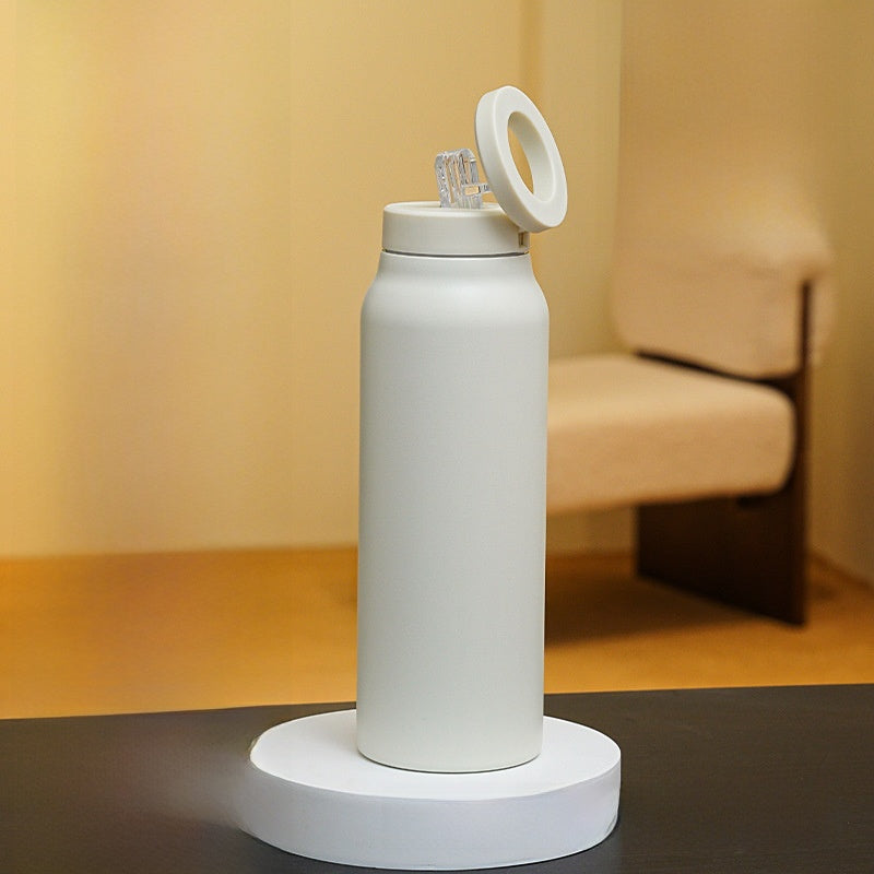 Botella de agua con aislamiento magnético con soporte para teléfono