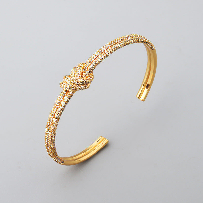 Pulsera de nudo de circón galvanizado de dos tonos