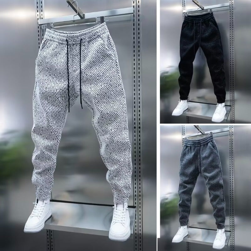 Pantalones casuales de corte holgado a rayas