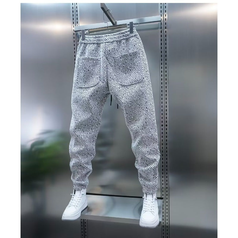 Pantalones casuales de corte holgado a rayas