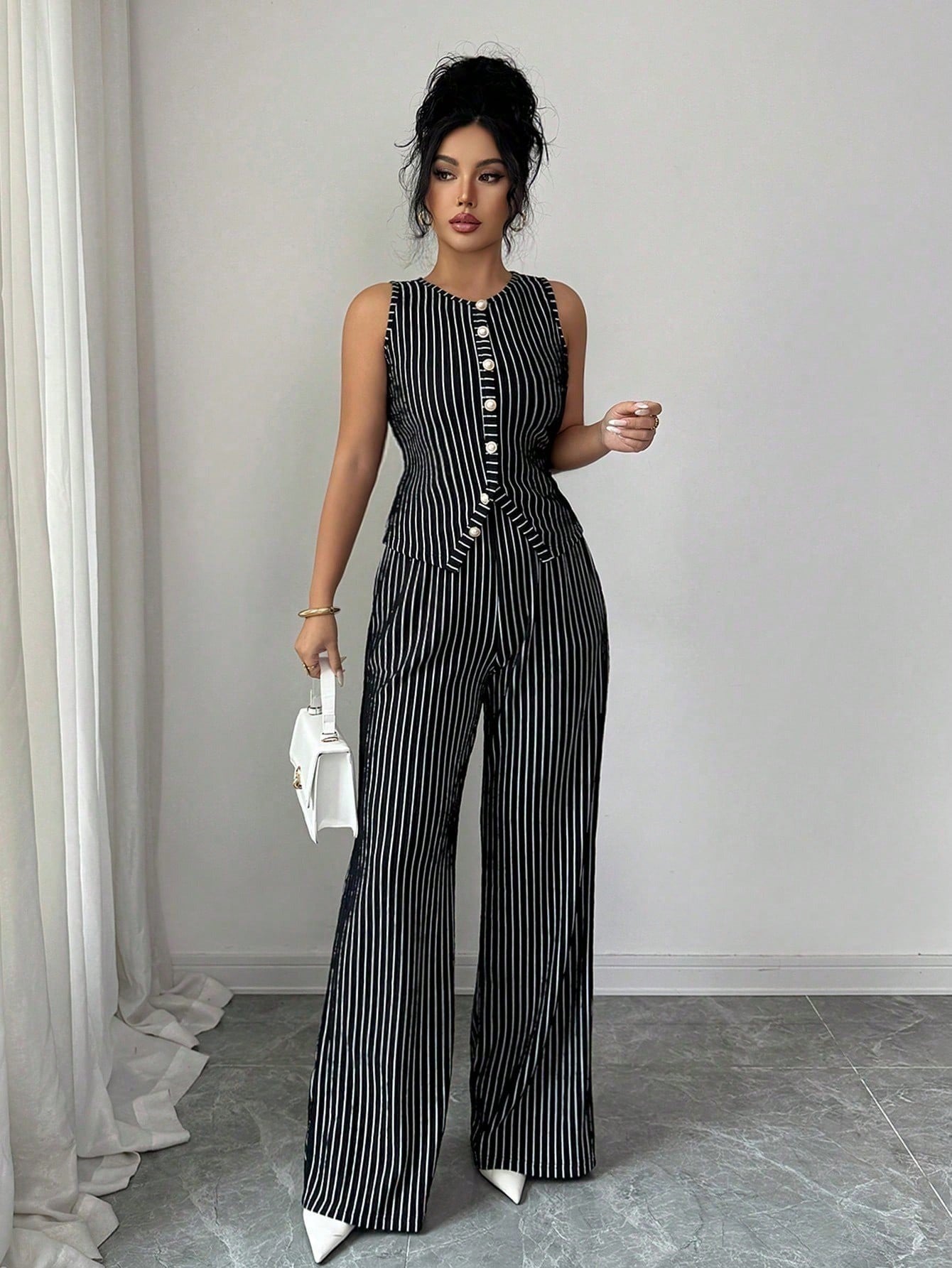 Conjunto de chaleco retro a rayas y pantalones de perna ancha para mujer