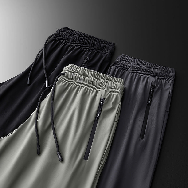 Pantalones deportivos transpirables elásticos de secado rápido
