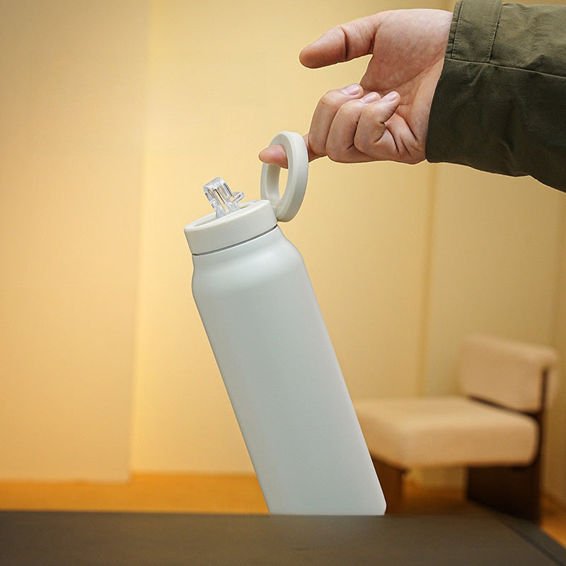 Botella de agua con aislamiento magnético con soporte para teléfono