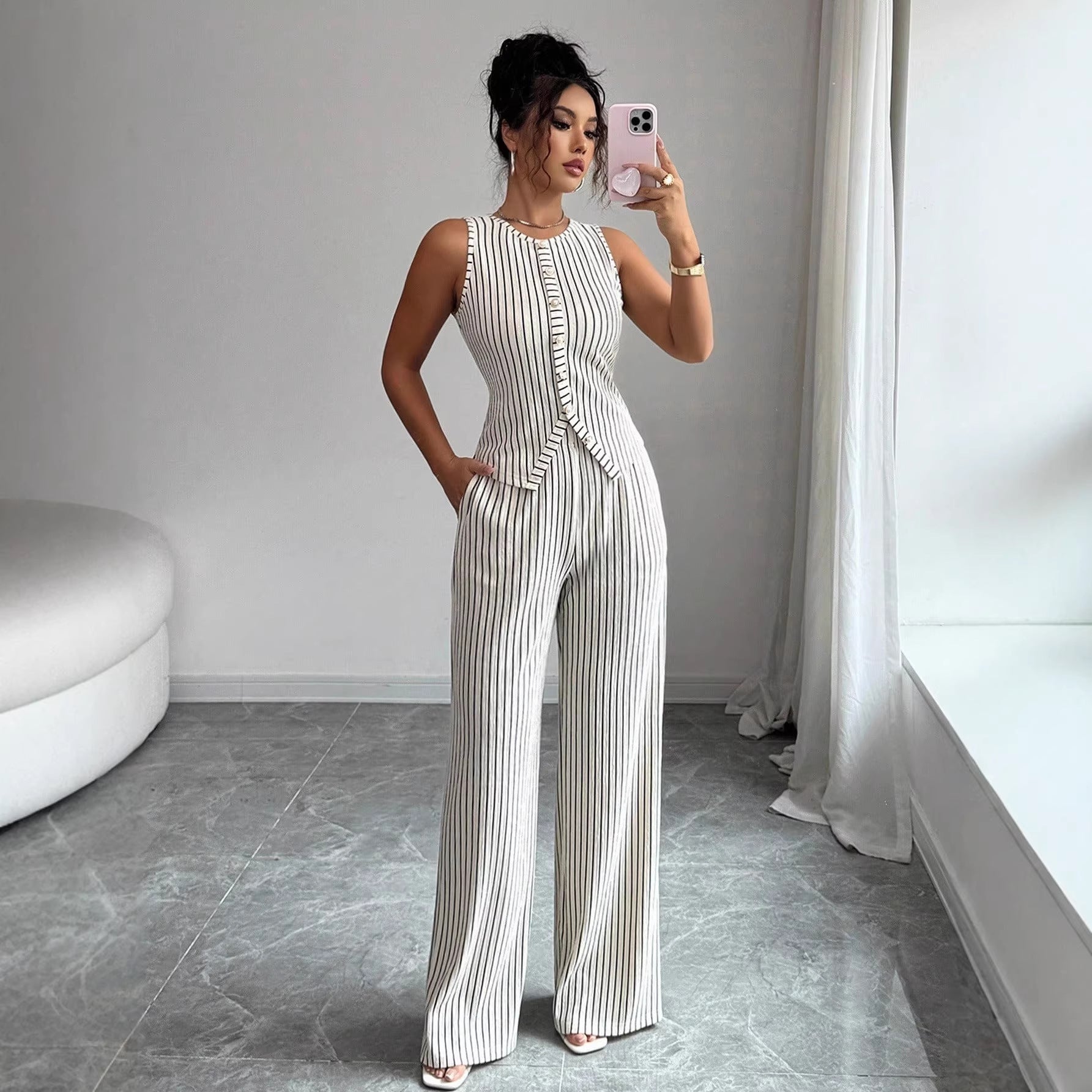 Conjunto de chaleco retro a rayas y pantalones de perna ancha para mujer