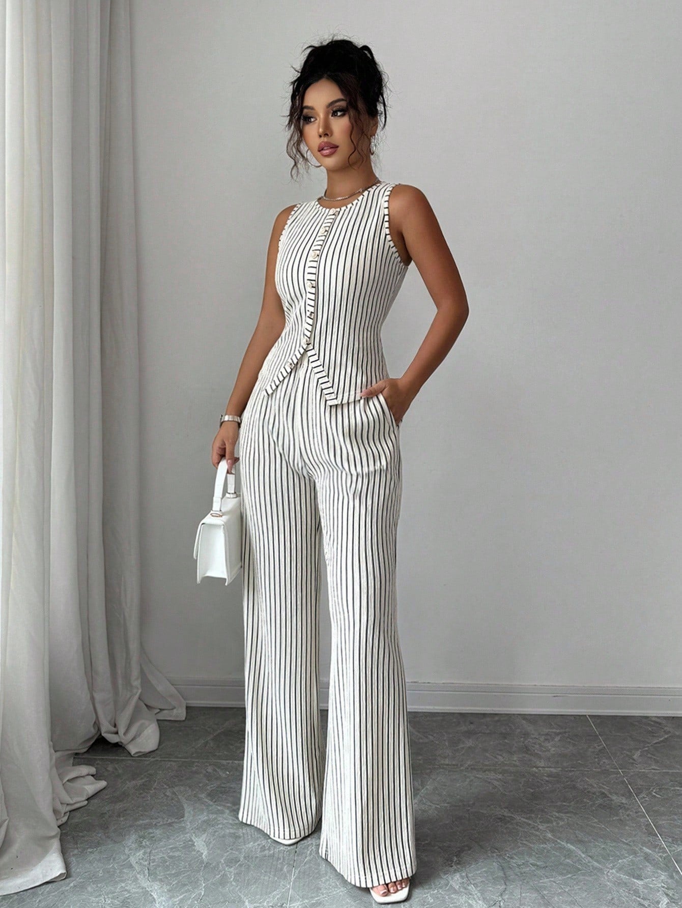 Conjunto de chaleco retro a rayas y pantalones de perna ancha para mujer