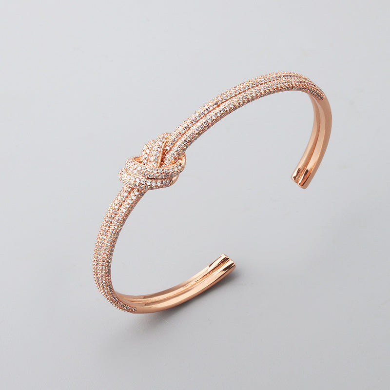 Pulsera de nudo de circón galvanizado de dos tonos