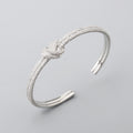 Pulsera de nudo de circón galvanizado de dos tonos