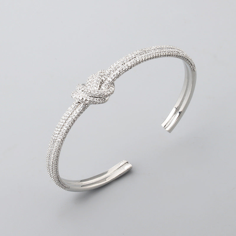 Pulsera de nudo de circón galvanizado de dos tonos