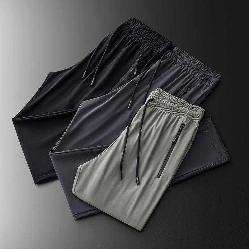 Pantalones deportivos transpirables elásticos de secado rápido