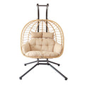 Silla colgante de mimbre