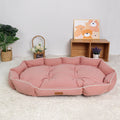 Cama ovalada de gamuza para perros